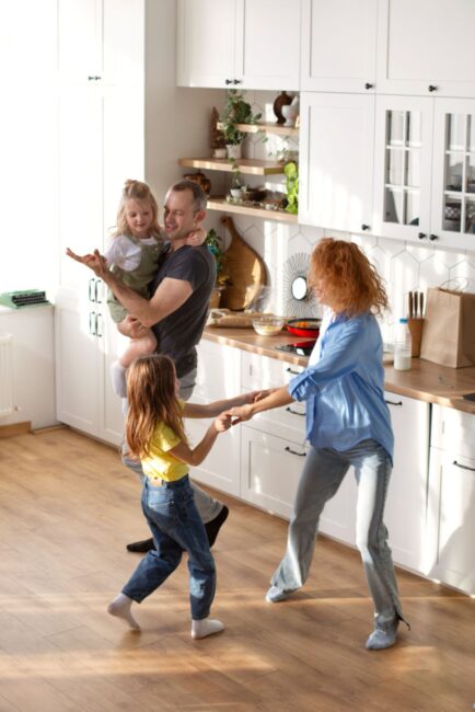 Family in the remodeled Winfield home
